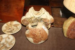 A Bernard Rooke pottery vase of rockwork form; and