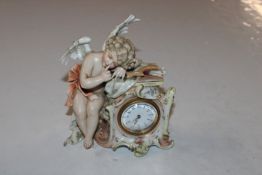 A Meissen style clock decorated with cherub AF