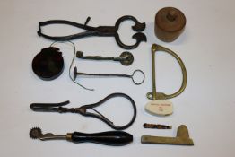 A box of vintage items including kit bag, lock, a