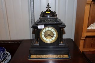 A Victorian marble and bronze mounted mantel clock