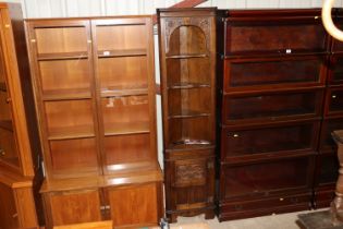 An oak Old Charm style corner cupboard