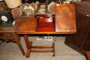 An late Victorian mahogany reading table, with rat