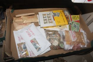 A box containing various world stamps