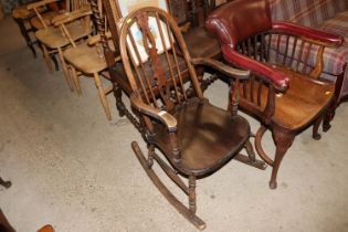 A stick back rocking chair