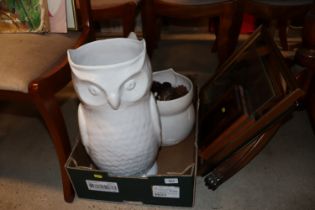 A collection of white china owl ornaments; owl pic