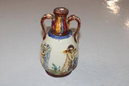 A hand painted Majolica style oil bottle AF conver