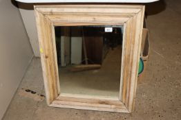 A pine framed wall mirror