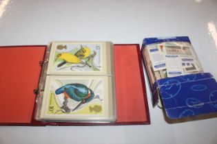 An album of post-cards and a box of tea cards