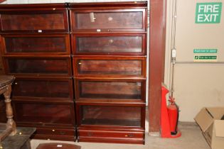 A Globe Wernicke five tier mahogany bookcase, fitt