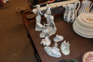 Seven Lladro porcelain figure groups