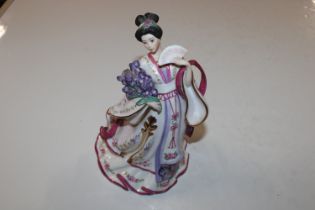 A Danbury Mint figure "The Iris Princess" by Nina