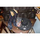 A pair of cowboy boots; two cowboy hats etc.