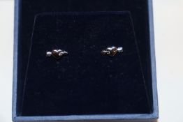 A Simply Silver pair of boxed heart shaped ear-rin