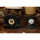 A Victorian black marble mantel clock with eight d