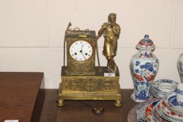 A 19th Century French gilt metal mantel clock with