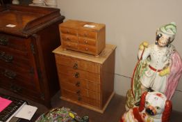 A lightwood five drawer specimen cabinet and a mi