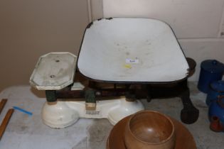 A set of iron and enamel kitchen scales; and a cas