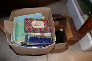 A collection of various vintage tins, ephemera, et