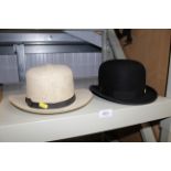 A Harrold's of London bowler hat and a Panama hat