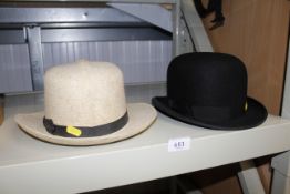 A Harrold's of London bowler hat and a Panama hat