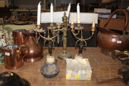 An ornate three branch candelabra; a pair of gilt