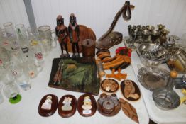 A collection of wooden items to include wall plaqu