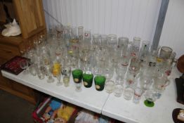 A collection of advertising drinking glasses