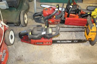 A Homelite petrol chain saw