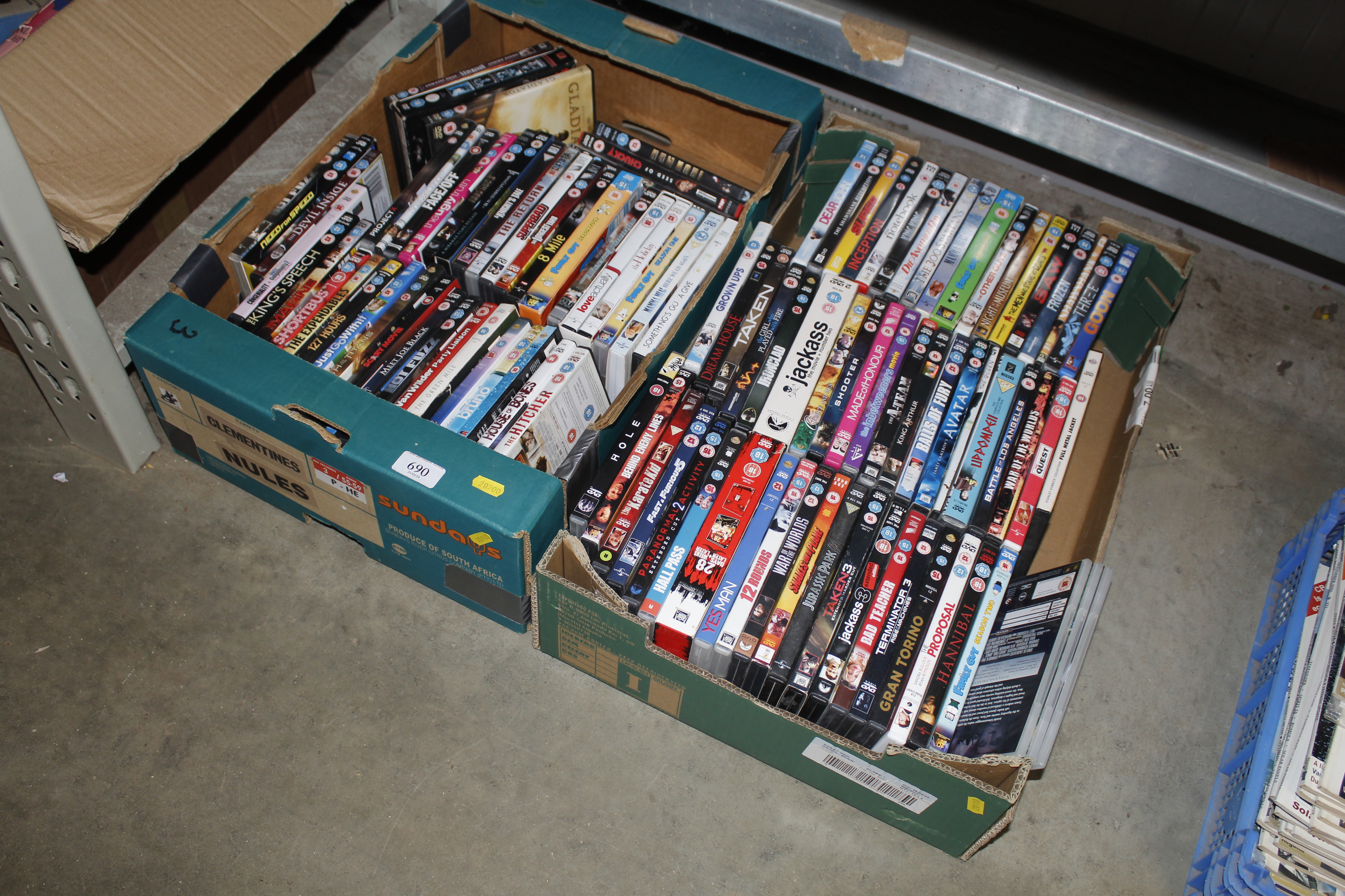 Two boxes of DVDs