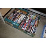 Two boxes of DVDs