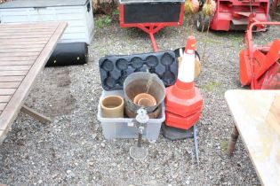 A quantity of cones, planters, small garden incine