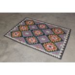 An approx. 5'1" x 3'5" Maimana Kilim rug