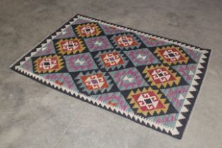 An approx. 5'1" x 3'5" Maimana Kilim rug