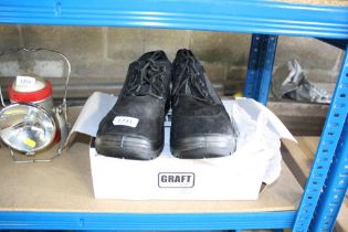 A pair of size 12 Graftgear safety boots