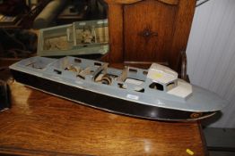 A model boat hull and engine