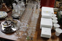 A collection of table glassware to include Champagne flutes