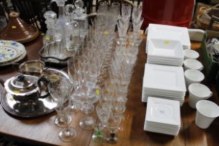 A collection of table glassware to include Champagne flutes