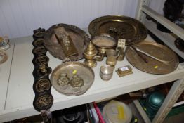 A collection of metal ware to include brass plaque; horse brasses on leather strap etc.