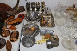 A collection of metal ware to include silver plated goblets, crumb tray and brush, candle stand,
