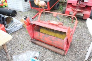 A ride on lawn mower roller