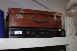 A vintage suitcase and briefcase