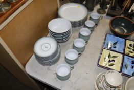 A collection of Denby dinner and tea ware