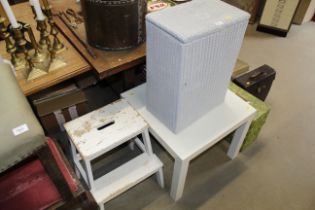 A modern white occasional table and a loom linen b