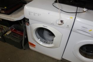 A Hotpoint Aquarius TV HM80 tumble dryer