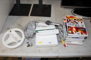 A Nintendo Wii with games and controlllers