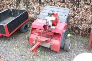 A ride on lawn mower grass collector with Briggs a