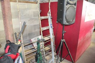 A clothes rail and a wooden and metal step ladder