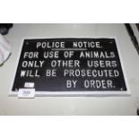 A reproduction "Police Notice" sign (226)