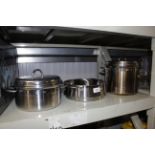 Two stainless steel saucepans and steamer dish