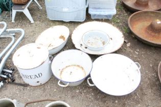 A collection of various enamel ware including brea